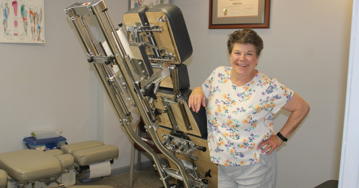Jodi Bassett, chiropractor, in her office at Harmony Healing Arts in Stuart, Iowa