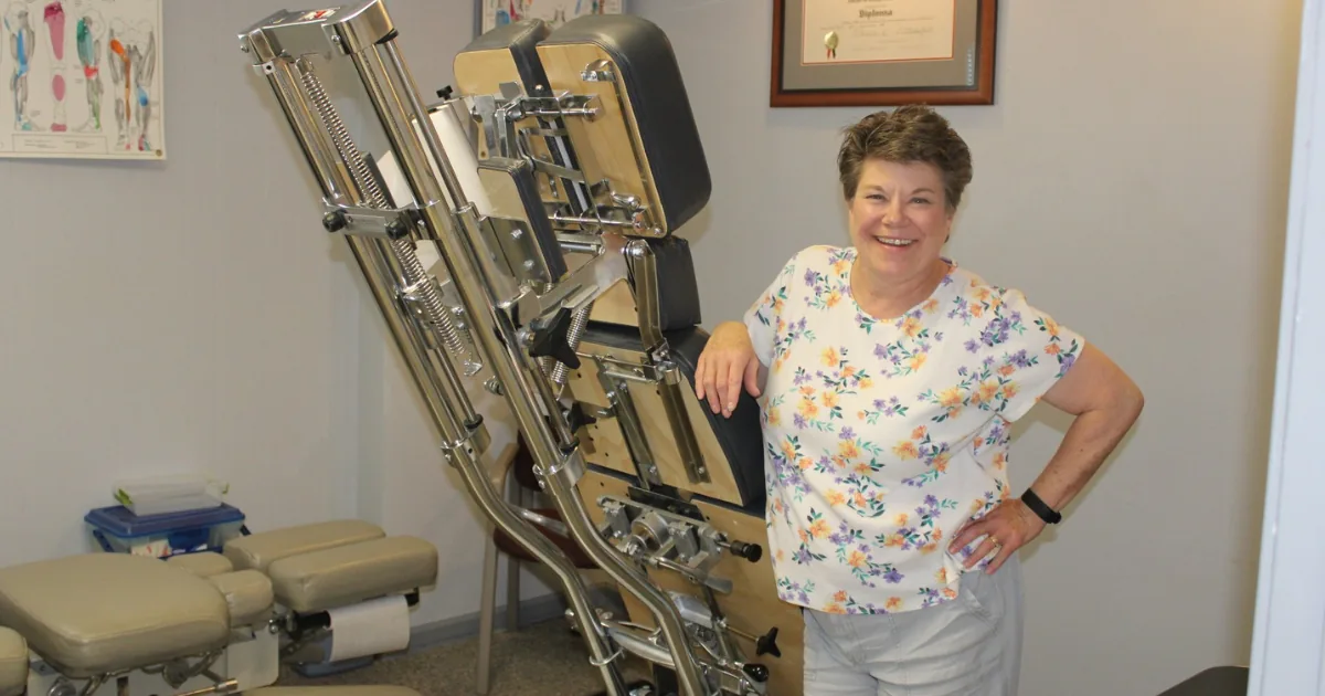 Jodi Bassett, chiropractor, in her office at Harmony Healing Arts in Stuart, Iowa